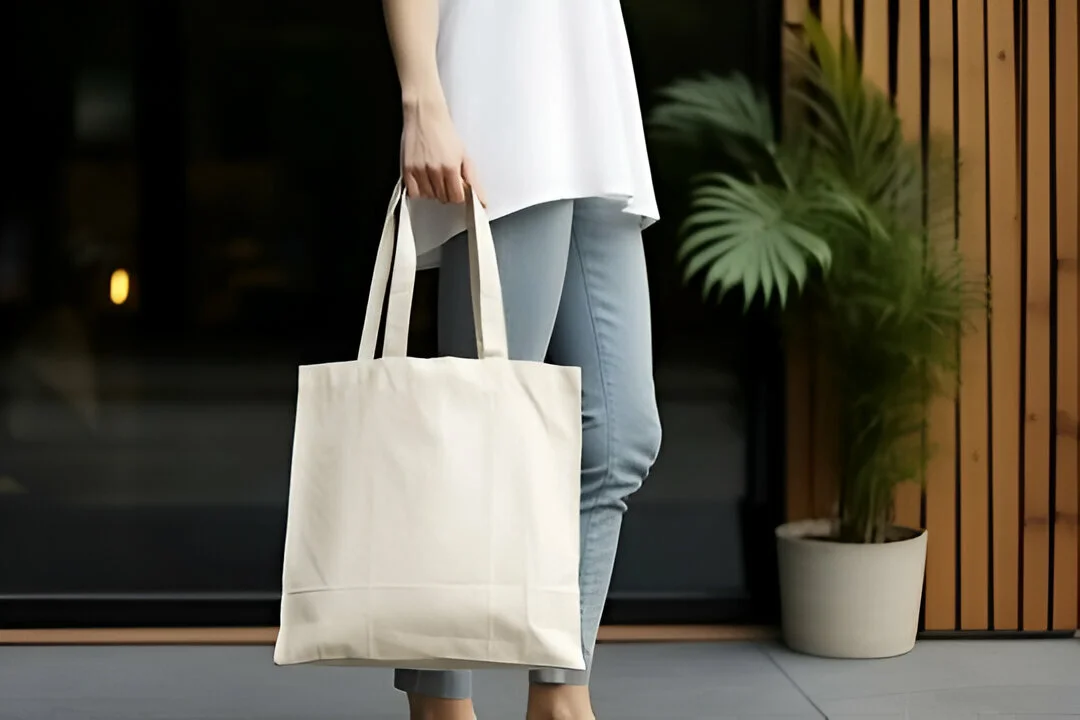 young-girl-is-carrying-a-blank-white-cotton-tote-bag